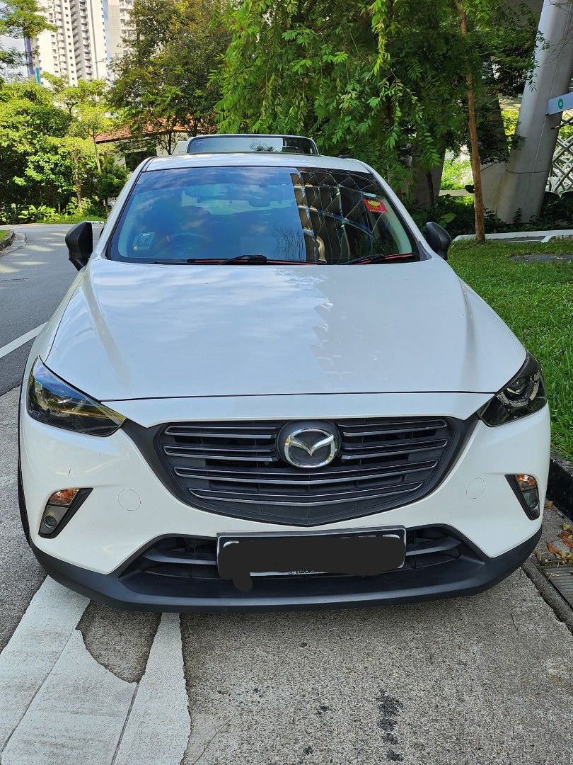 Mazda CX-3 2.0 Deluxe (A) (Category: Used Cars) located in Singapore. Submitted by hmbb123 (Listing ID 1326857336, Image 3). Description: Dealers will be ignored. Only dealing with direct buyer. - 1st Owner - Carefully maintained - Original sunroof - Newly changed Goodyear F1A6 19inch tyres - Nashin Big Brake Kit - 19 Rims - Matching red rear brake callipers - Real carbon fibre steering - Ultra racing front strut and arb - paddle gear shifter - A