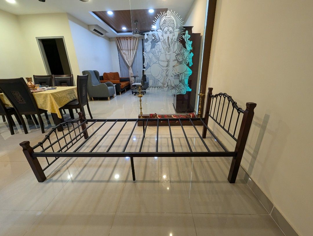 Single Bed (Category: Bed Frames & Mattresses) located in Kuala Lumpur. Submitted by joyfulstrawberry (Listing ID 1326960944, Image 3). Description: Colour : Black metal + Wood Panel Material : Metal + wood Dimension : L200cm x W90cm x H80cm Selling for RM 200. In perfect condition, rarely used. Please private message if interested. Thank you 🙏🏼.