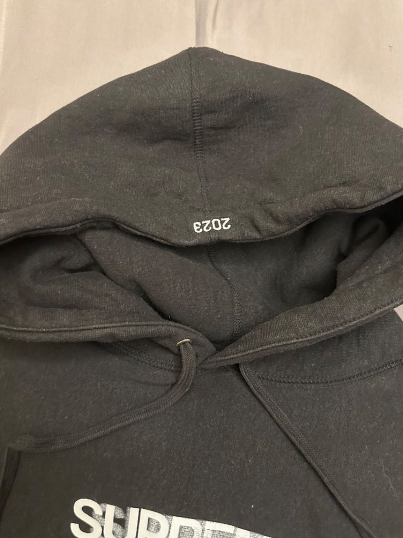 Supreme motion logo hoodie black top