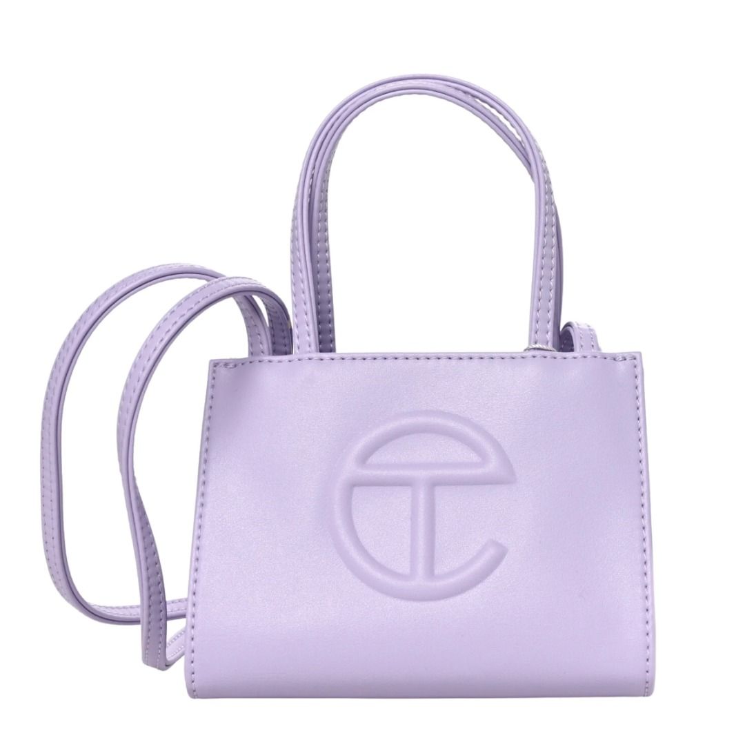 Telfar Small Shopping Bag - Lavender (Category: Cross-body Bags) located in Manila. Submitted by msgme (Listing ID 1326893086, Image 1). Description: Brand new with tag and dust bag! Onhand, ready to ship. Height 4 3/4", Width 6 5/8", Depth 3", Strap Drop 21", Handle Drop 4 3/4".