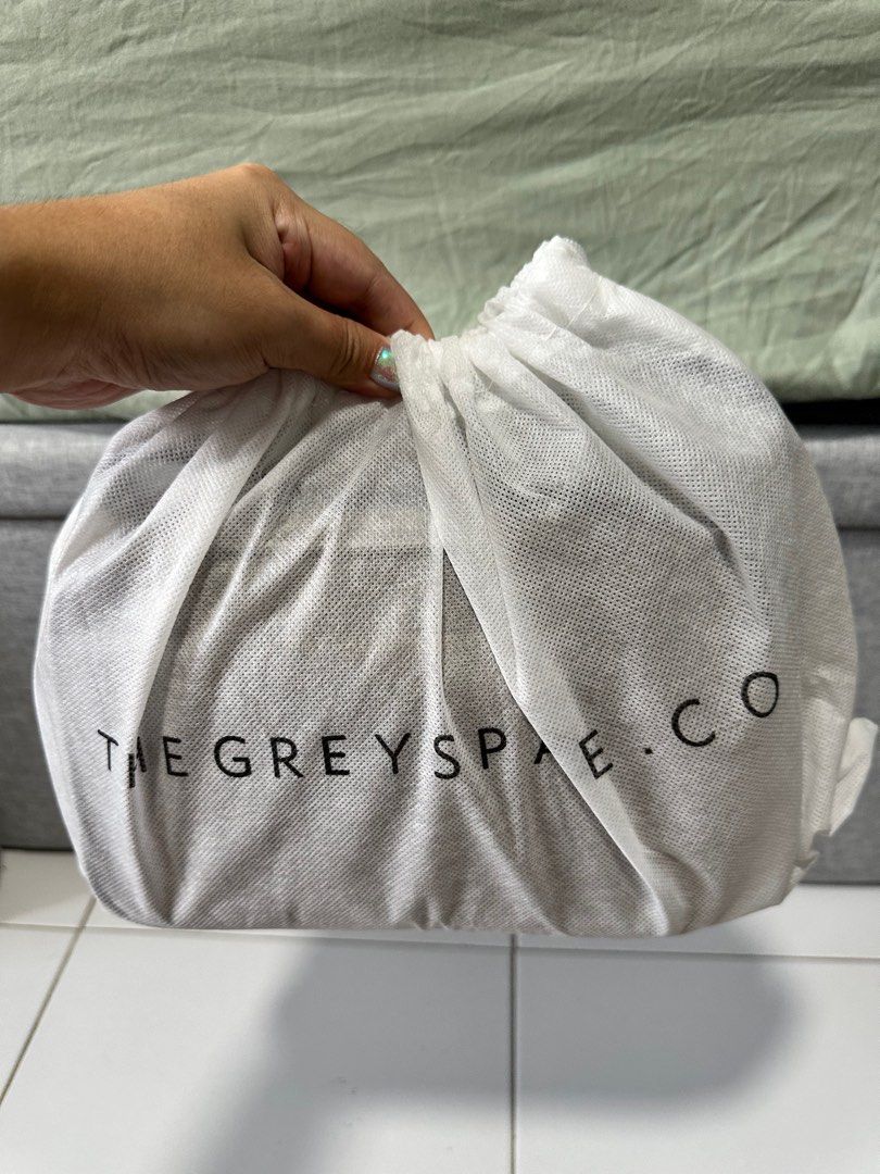 The grey space sling bag (Category: Cross-body Bags) located in Singapore. Submitted by seeingyou (Listing ID 1326940887, Image 3). Description: Lightly used for less than 5 times, no stratches at all Great for everyday use! Come with 2 dust bags Reasons for selling: too many bags.