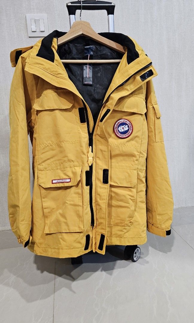 Winter Jacket (Category: Coats, Jackets and Outerwear) located in Singapore. Submitted by smileyg (Listing ID 1326963413, Image 1). Description: Yellow jacket, L size, suitable for 55kg to 60kg range..