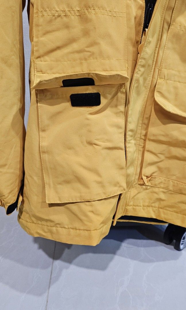 Winter Jacket (Category: Coats, Jackets and Outerwear) located in Singapore. Submitted by smileyg (Listing ID 1326963413, Image 2). Description: Yellow jacket, L size, suitable for 55kg to 60kg range..