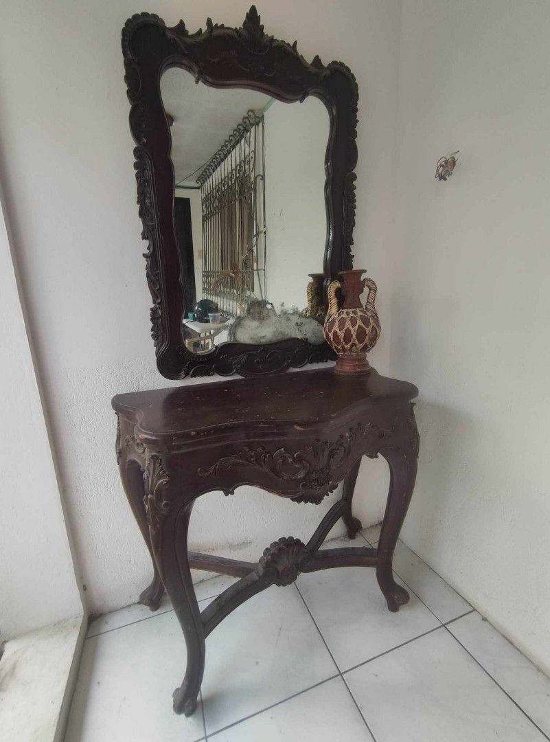 Antique Dukit Narra Console Table with Mirror (Category: Tables & Sets) located in San Fernando. Submitted by josephtanjuaquio (Listing ID 1327165883, Image 1). Description: Antique Dukit Narra Console Table with Mirror Console Table size 31x38in 17in height Mirror size 30x43in DM/PM for Interested. We ship nationwide. GodBlessed Yall.😊.