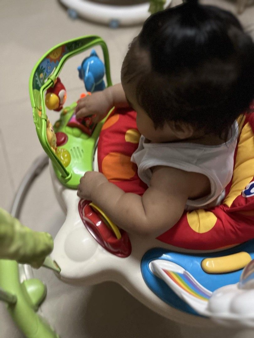 Fisher Price rainforest jumperoo (Category: Infant Playtime) located in Cavite. Submitted by dimple082 (Listing ID 1327166594, Image 2). Description: good condition, minor scratches.