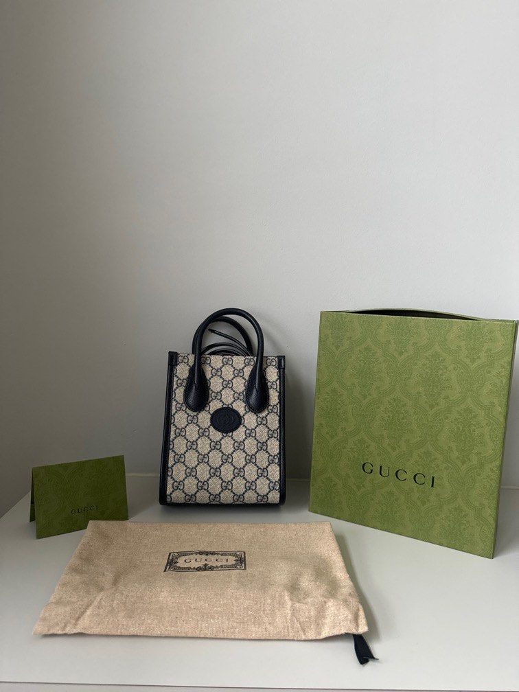 Gucci Mini Tote Bag (Category: Bags & Wallets) located in Singapore. Submitted by xyz900 (Listing ID 1327110251, Image 2). Description: Gucci Mini Tote Bag with interlocking G. Selling as clearing space at home. Full set - original box, receipt (bought in SG), dustbag and paper bag. Note: slight damage to box as SA gave too small a box (not sure why also). see last pic. Condition: 8/10 .