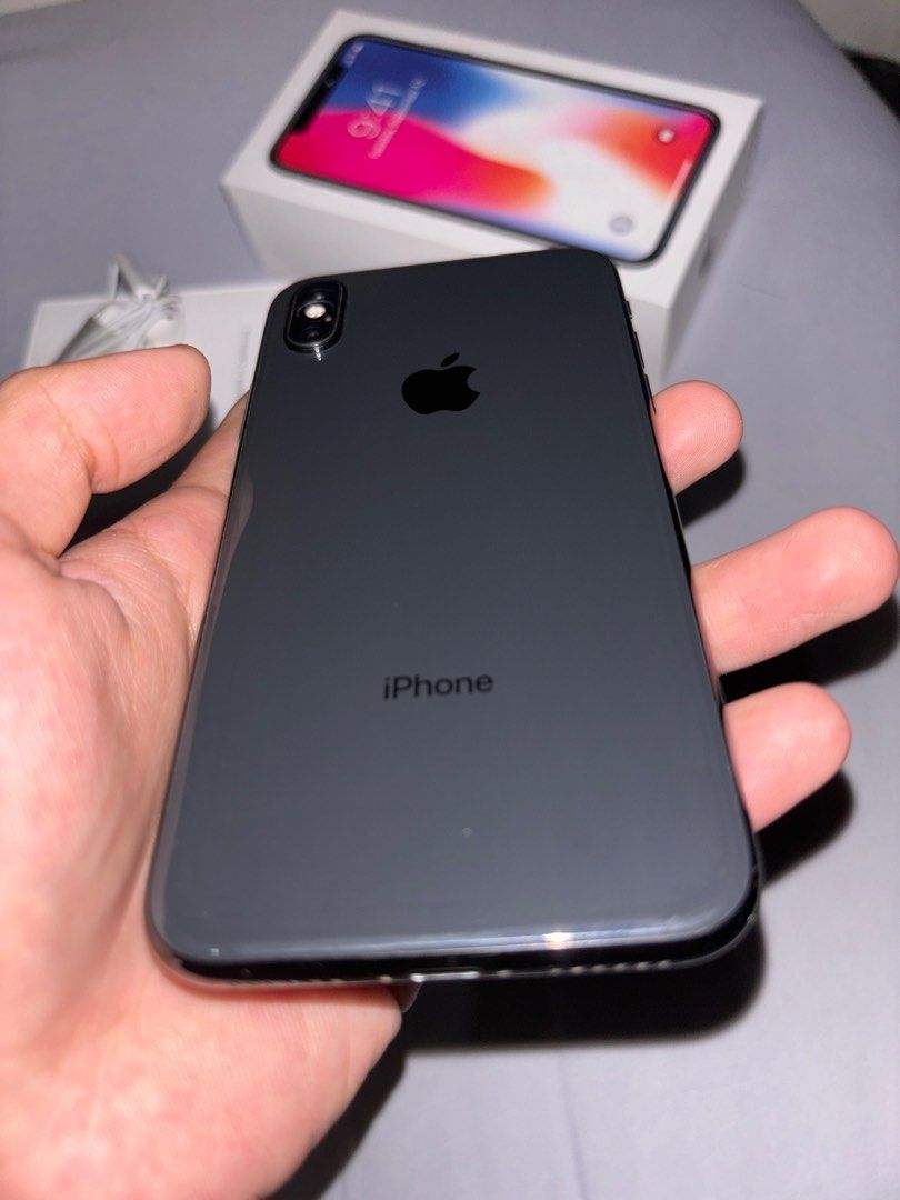Iphone X (256GB) w/ Original Box (Category: iPhone X Series) located in Cavite. Submitted by harveythrift (Listing ID 1316011385, Image 3). Description: IPHONE X (256 GB) WITH BOX black 71% bh newly replaced lcd bnew lcd additionals: 2 phone cases w/ earphones issues: true tone face id.