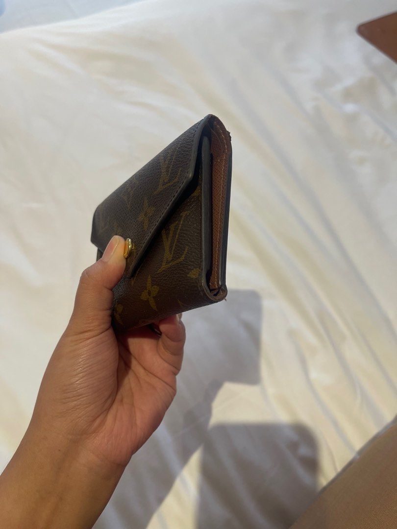LV victorine wallet (Category: Luxury Bags & Wallets) located in Caloocan City. Submitted by stash2 (Listing ID 1327106657, Image 3). Description: Bought in Greenbelt last 2021. Complete inclusions and receipt. Flaw: button still closes but doesn’t snap; rubber lining needs a little bit of retouch In very good condition .