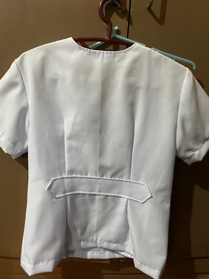 MCU female medtech blouse (Category: Blouses) located in Quezon City. Submitted by aliyahsam (Listing ID 1327001825, Image 2). Description: -MCU 3rd year female blouse uniform -size: XS to S -check the photos for measurements -left side buttons and right side pockets -u can personally try it at school since i still have ojt at mcu hospital (payment first, then ill refund it after u return the item if it doesn’t fit u) -idk what the cloth is calle