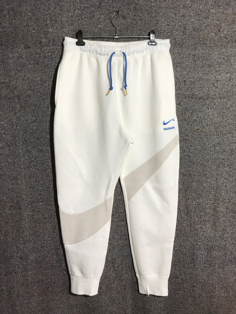 nike swoosh oversized joggers in white