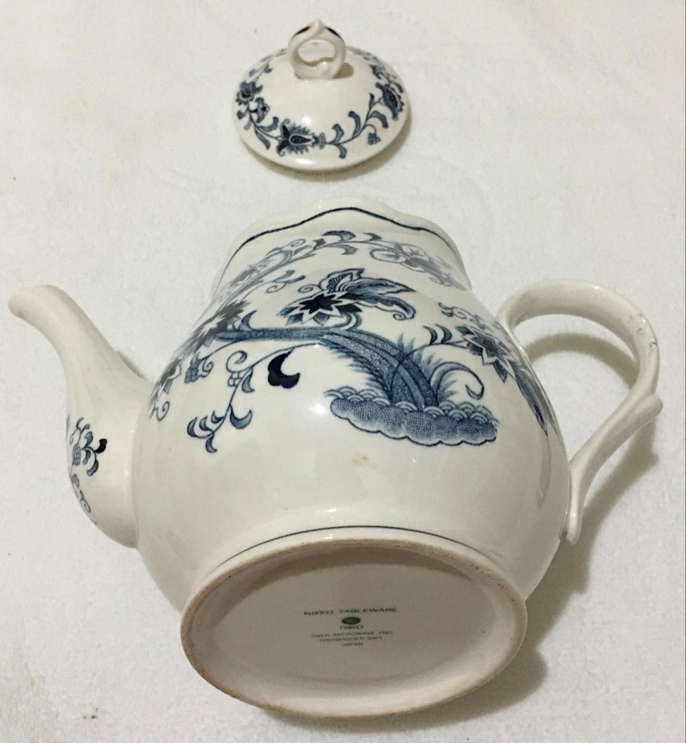 Nikko Tableware Tea Pot (Category: Coffee & Tea Tableware) located in San Jose del Monte. Submitted by eivon29 (Listing ID 1327190482, Image 2). Description: see picture. It has crazes but overall it is still usable and beautiful, and needs cleaning..