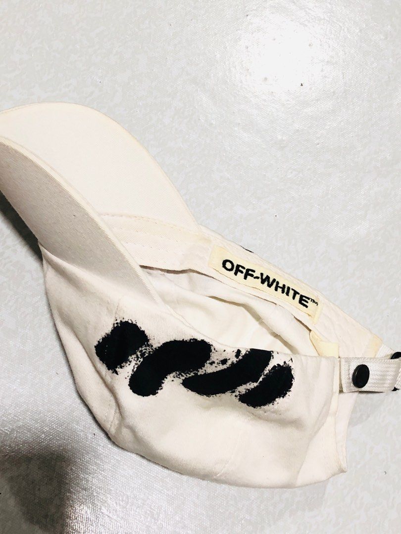 Off White Diag Spray Paint Baseball Cap (Category: Caps & Hats) located in Manila. Submitted by declutterwithzed (Listing ID 1327174042, Image 3). Description: Need wash lang. Off White Cap Dad hat .