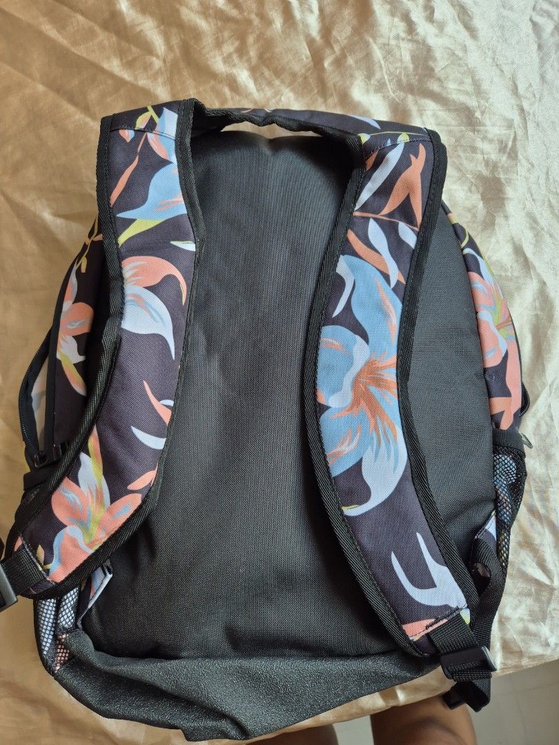 Roxy Backpack (Category: Backpacks) located in Singapore. Submitted by coolearth_.forest (Listing ID 1327077594, Image 2). Description: used a few times but looks food still as well maintained. alot of compartments. got 2 sides can put bottles & umbrella. got laptop compartment. can also hook keys on the key hook. a very good bag for someone with alot of stuff to lug around..