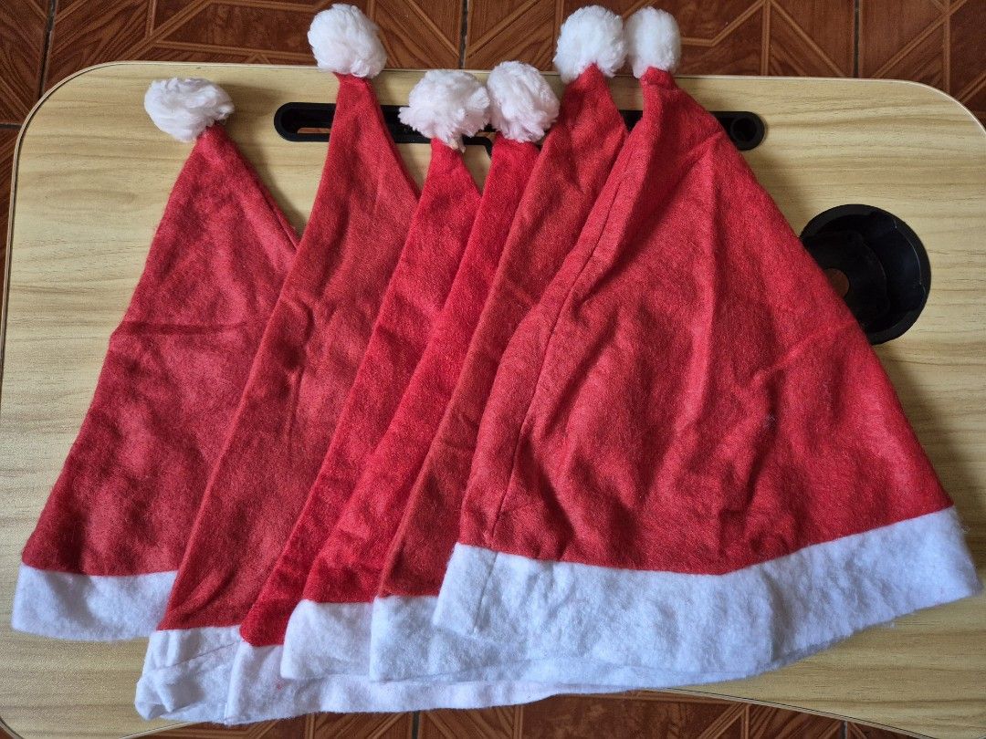 Santa Hats for Costumes or Parties (Category: Everything Else Others) located in Mandaluyong City. Submitted by sdl_ftn (Listing ID 1327092011, Image 2). Description: Selling 6 preloved but well-kept Santa Hats. - 5 fits medium to large, 1 small - Kung ano po Yung nasa pics ang available RFS: decluttering MOP: Gcash/BPI/Maya SHIPPING/DELIVERY: Lalamove/LBC/J&T *SF to be shouldered by buyer. MEETUP: RUBLOU GREENLAND ALONG A. BONIFICIO CAINTA / McD