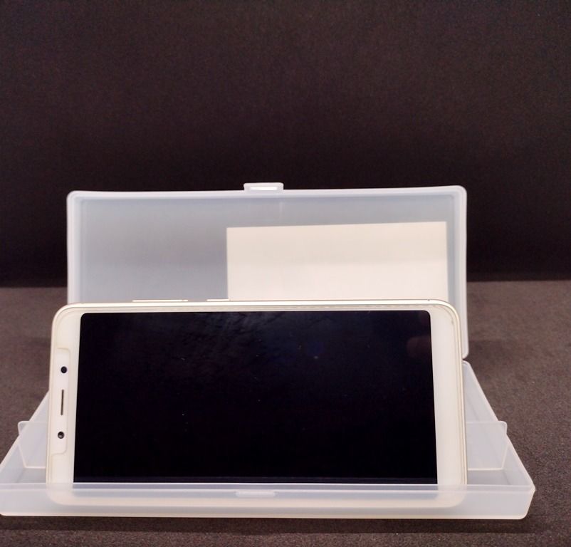 Smartphone Holder / Stand / Accessory Case - Made in Japan (Category: Mounts & Holders) located in Quezon City. Submitted by mondy_mond (Listing ID 1327103634, Image 3). Description: This Smartphone Holder / Stand / Accessory Case... *Made in Japan (See image #6, #9) *Functions as horizontal stand/holder for cellphone (See images #2, #3, #4, #7) *Serves as storage case for accessories (smartphone pin, extra SIM card, pick, USB cable, pen, microfi