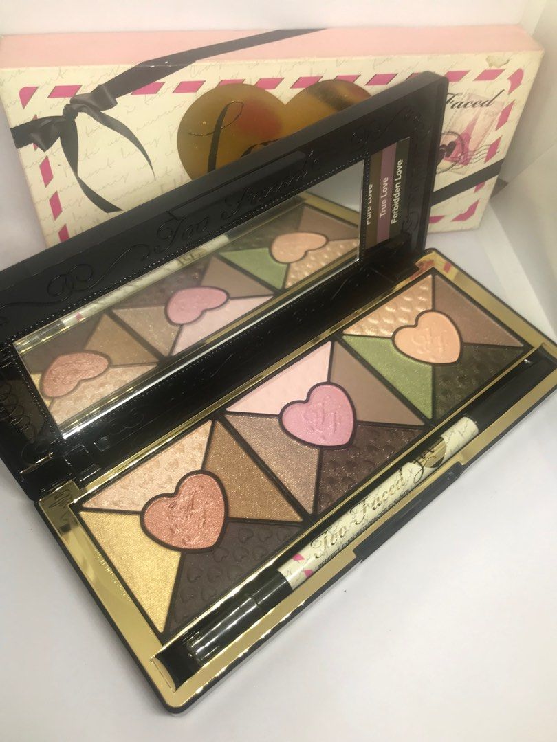 Too Faced Love Palette (Category: Makeup) located in Quezon City. Submitted by currency27 (Listing ID 1327166100, Image 1). Description: The Too Faced Love Palette contains fifteen eyeshadows split into three combinations, a how to get the look guide, and a Perfect Eyes Eye Liner all housed in a pretty little compact. The Too Faced Love Eyeshadow Palette comes with 15 shades of shadows broken up into three different looks with a range of shades i