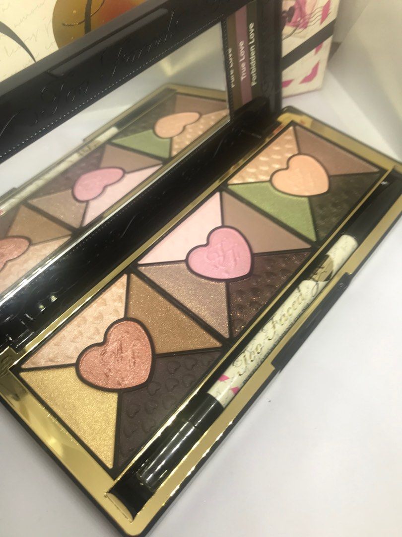 Too Faced Love Palette (Category: Makeup) located in Quezon City. Submitted by currency27 (Listing ID 1327166100, Image 3). Description: The Too Faced Love Palette contains fifteen eyeshadows split into three combinations, a how to get the look guide, and a Perfect Eyes Eye Liner all housed in a pretty little compact. The Too Faced Love Eyeshadow Palette comes with 15 shades of shadows broken up into three different looks with a range of shades i