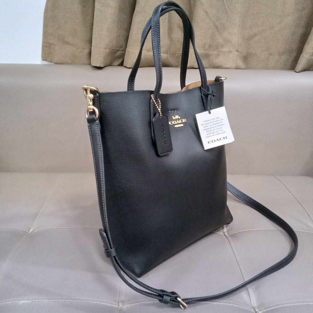 Coach Thea Small Tote (Category: Luxury Bags & Wallets) located in Taguig. Submitted by esa.agustin (Listing ID 1327286983, Image 2). Description: Original Coach Thea black small leather tote bag. With sling, tag and dust bag..