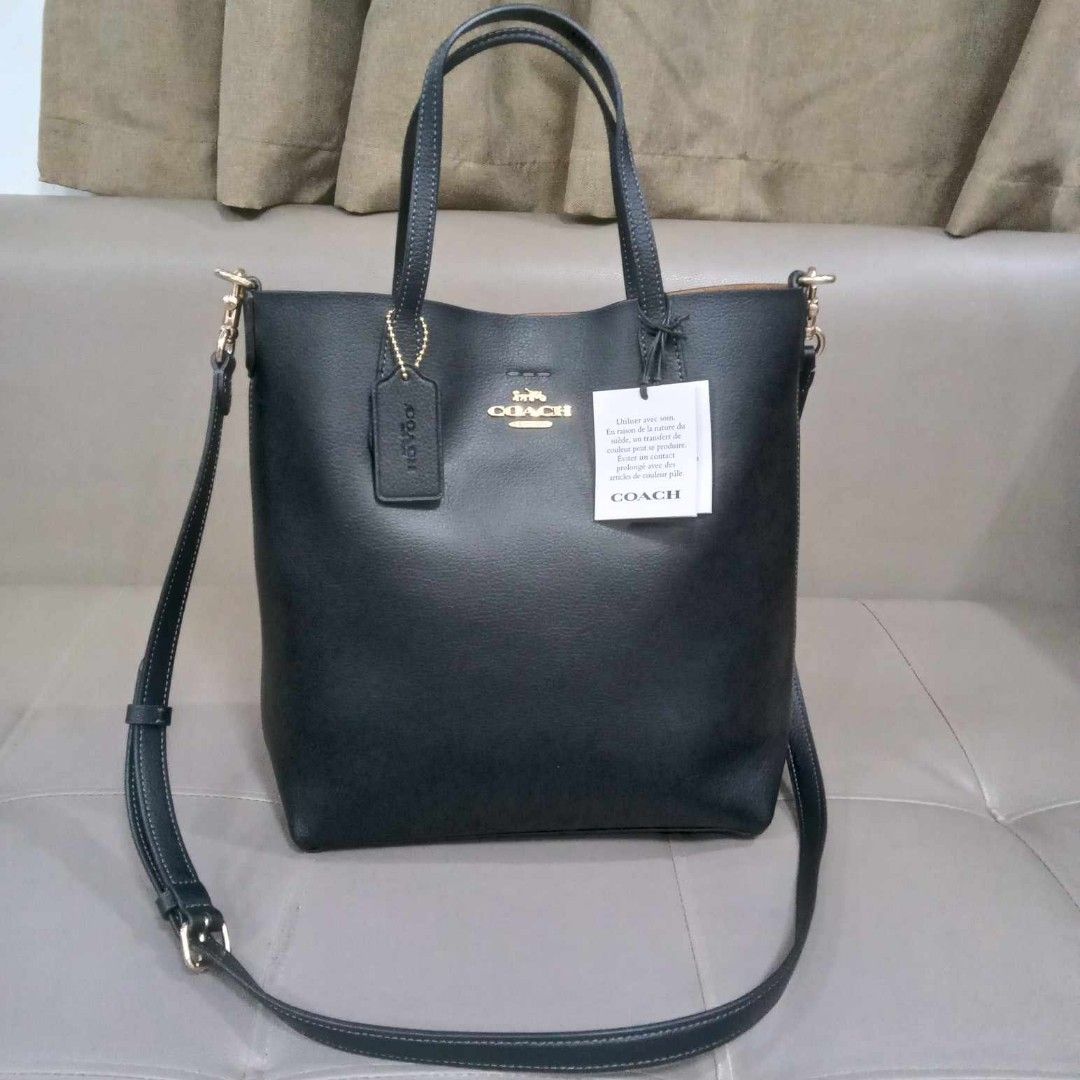Coach Thea Small Tote (Category: Luxury Bags & Wallets) located in Taguig. Submitted by esa.agustin (Listing ID 1327286983, Image 1). Description: Original Coach Thea black small leather tote bag. With sling, tag and dust bag..