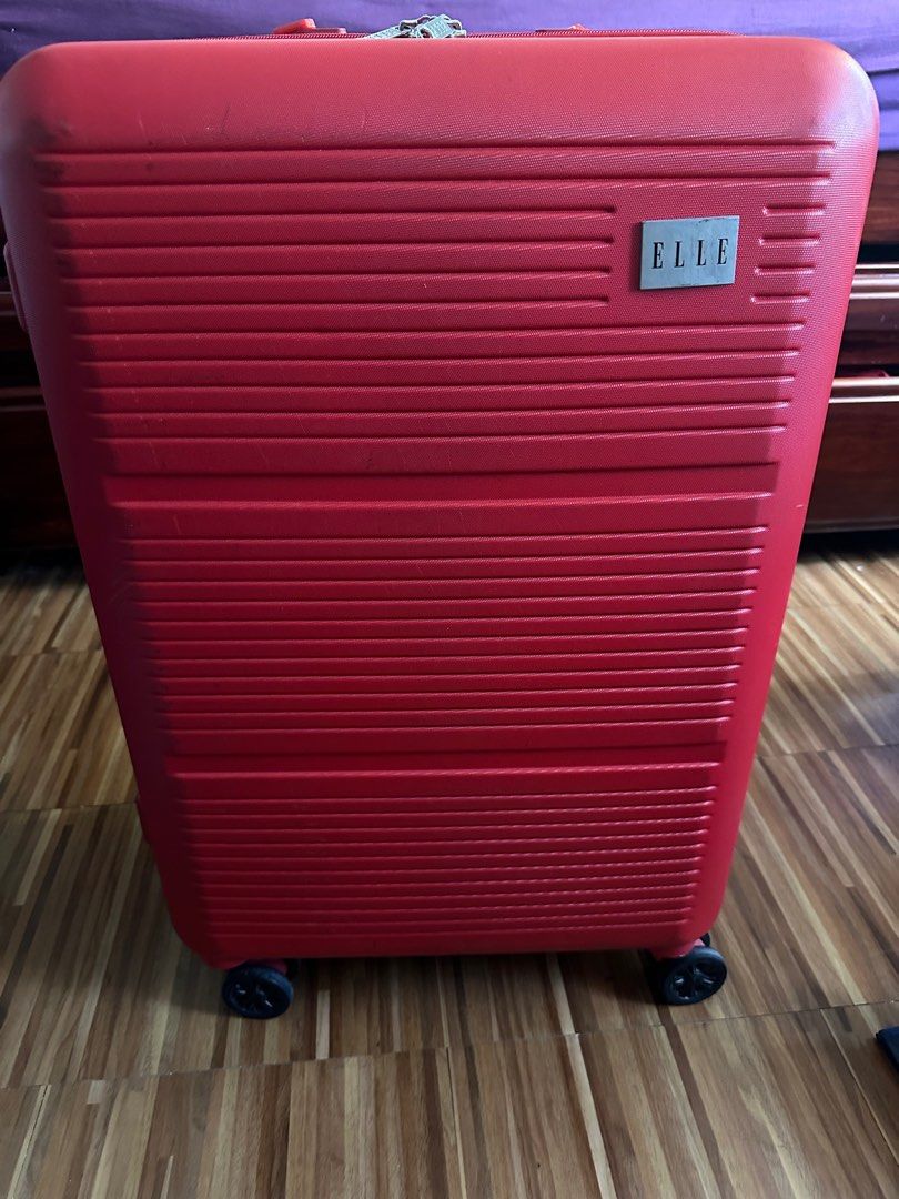 Elle (Medium size Luggage, Red) (Category: Luggage) located in Bacoor. Submitted by rodolfotaton_jr_bear (Listing ID 1327238517, Image 2). Description: Elle (Medium Size) Red Luggage RFS: old and its carry straps are damage.