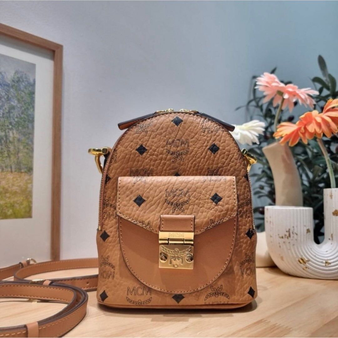 Mcm mini backpack sling discount