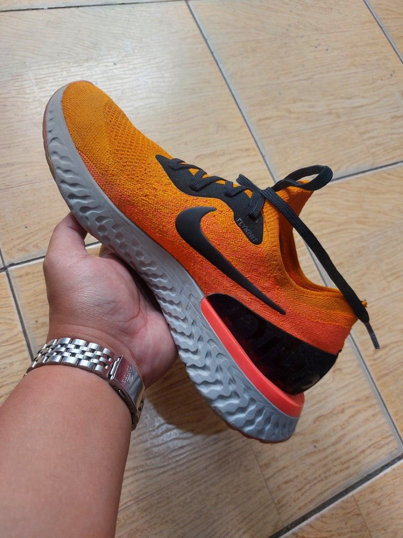 Nike Epic React Flyknit 'Cooper Flash' Men's Running Shoes(27.5 cm) (Category: Sneakers) located in Baguio. Submitted by brand_master (Listing ID 1327362146, Image 2). Description: Authentic Nike Epic React Flyknit 'Cooper Flash' Men's Running Shoes Size 9.5 US/27.5 cm/43 Europe Slightly used Thick outsole No box No issue In excellent condition.