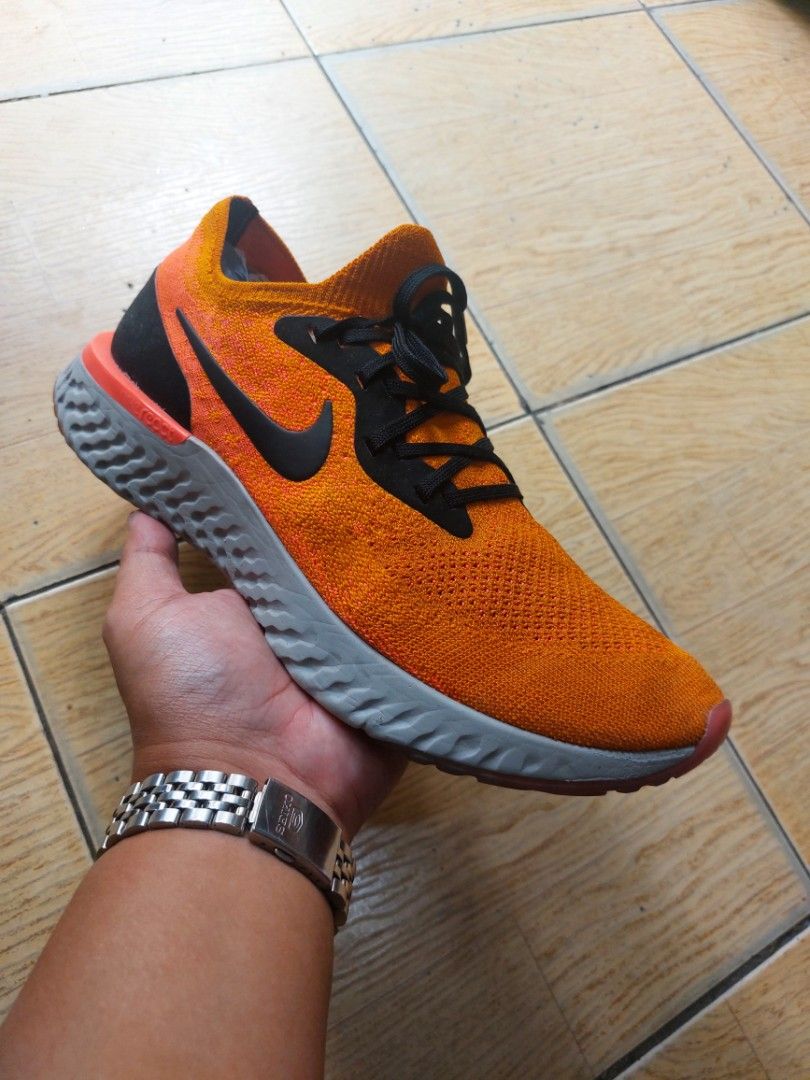 Nike Epic React Flyknit 'Cooper Flash' Men's Running Shoes(27.5 cm) (Category: Sneakers) located in Baguio. Submitted by brand_master (Listing ID 1327362146, Image 1). Description: Authentic Nike Epic React Flyknit 'Cooper Flash' Men's Running Shoes Size 9.5 US/27.5 cm/43 Europe Slightly used Thick outsole No box No issue In excellent condition.