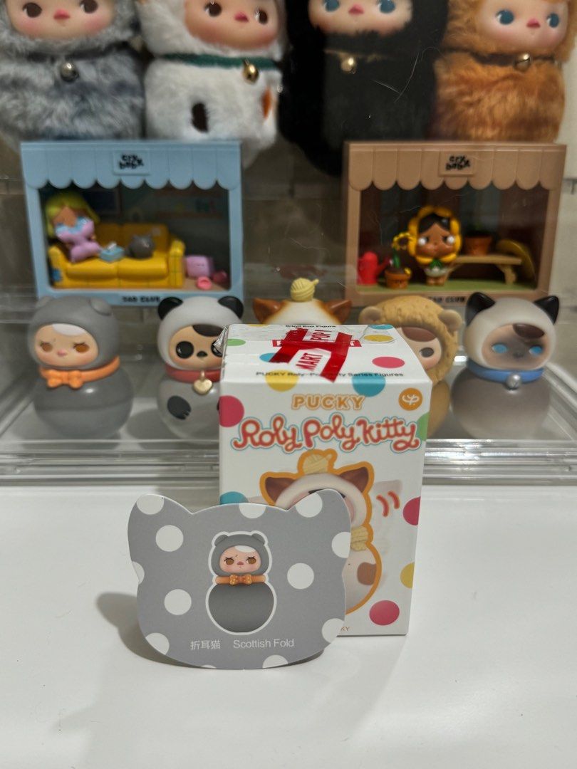 POP MART Pucky Roly Poly Kitty Figure (Category: Designer & Blind Box Toys) located in Quezon City. Submitted by sa_cci (Listing ID 1327314516, Image 3). Description: WTS/LFT ROLY POLY KITTY FIGURE - SCOTTISH FOLD opened box but sealed foil RFS/RFT: Dupe 🥺 Kakabili lang kahapon sa SG 🇸🇬 ₱600 or Trade •Siamese •Siberian •Devil •Sphynx •Bengal Willing to add if ever ☺️ 📍Mandaluyong City.