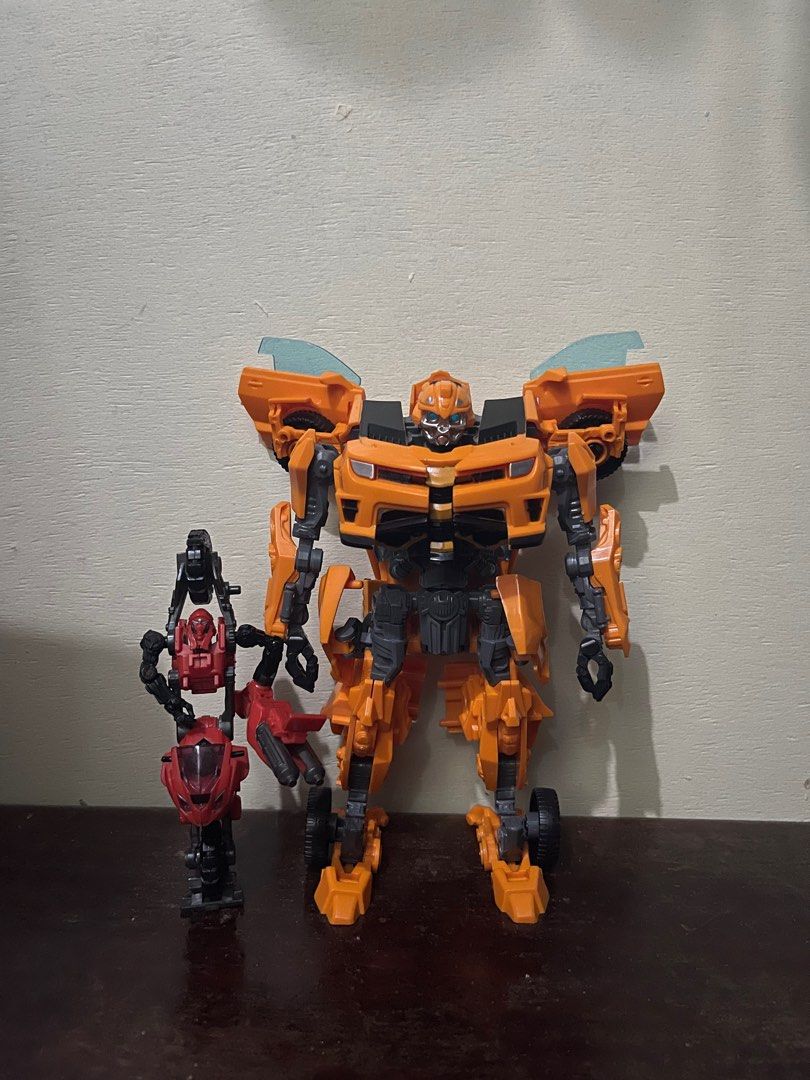 Transformers Human Alliance Arcee and DOTM KO Bumblebee (Category: Figurines & Statues) located in Imus. Submitted by jimirduminding (Listing ID 1327252557, Image 3). Description: KO DOTM Bumblebee- painted wheels Human Alliance Arcee - loose right arm Both no manual and box Mode of Payment - GCash Shipping options - Payment first before delivery, via Lalamove, at buyer’s expense. Location: Imus City, Cavite.