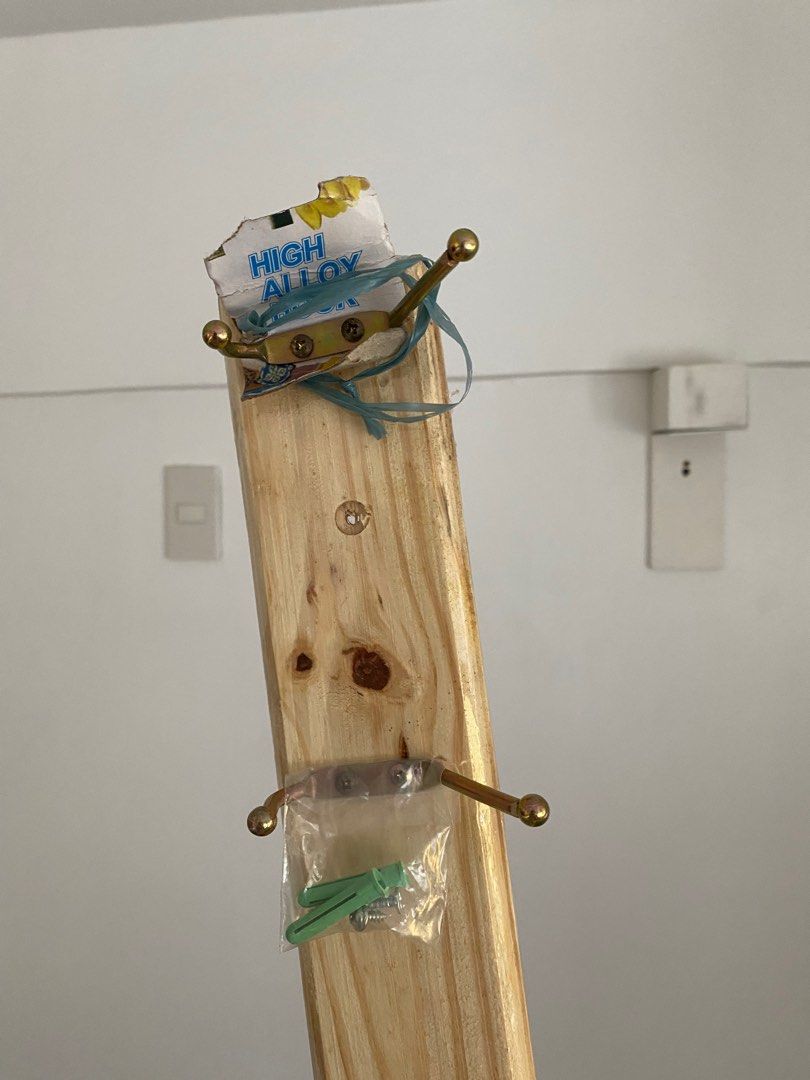 Wall hook rack (Category: Bathroom & Kitchen Fixtures) located in Manila. Submitted by aj927 (Listing ID 1327221056, Image 2). Description: 6-piece hook with wooden rack for wall mounting Intended for wall fixture via screw but can be renter friendly (use wall hanging strips) Slightly negotiable, never been used/open & complete screws RFS: decluttering.