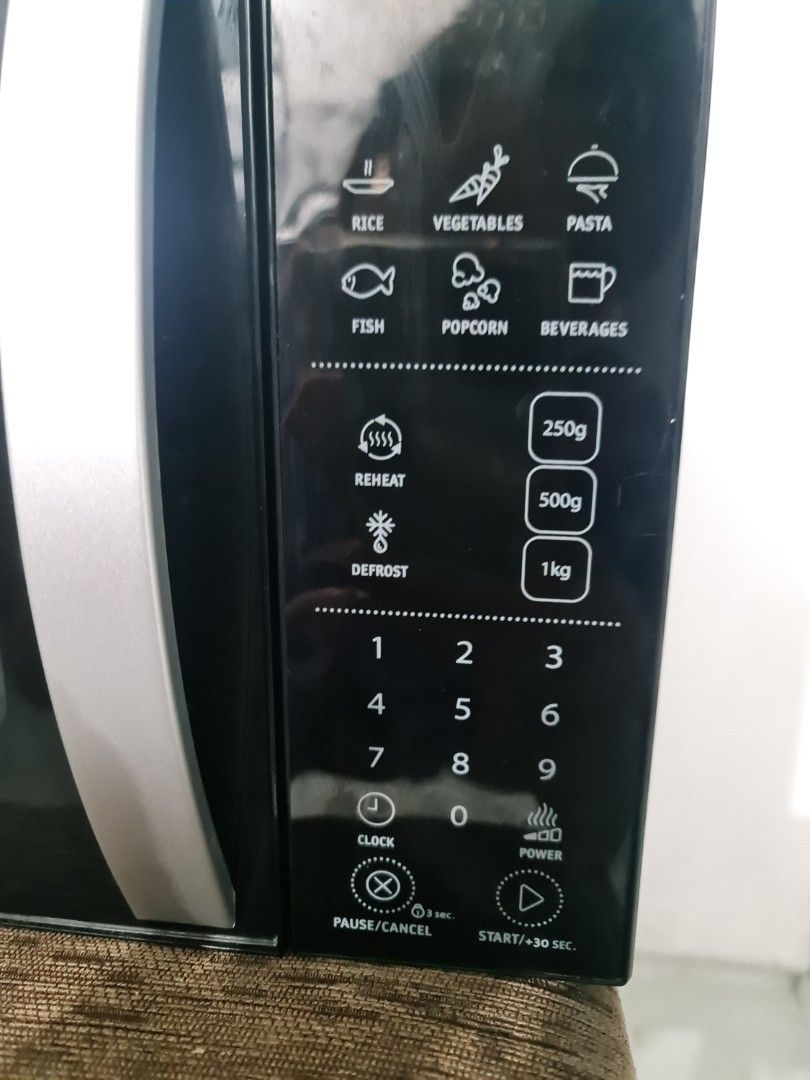WHIRPOOL DIGITAL MICROWAVE (Category: Ovens & Toasters) located in Makati City. Submitted by junaree (Listing ID 1327353749, Image 3). Description: WHIRLPOOL MICROWAVE Originally bought for 6K at SM Appliance Store No box SF should be shouldered by buyer RFS: used about 4 times only..