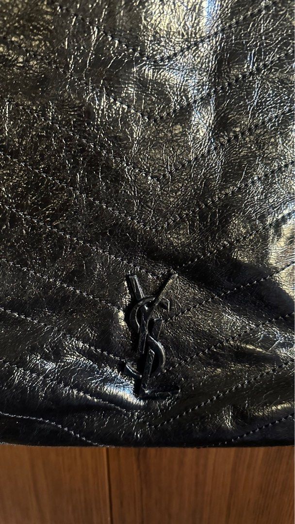 YSL Black Shoulder / Sling (Category: Shoulder Bags) located in Marikina City. Submitted by coco_lolo (Listing ID 1327259384, Image 2). Description: Black Leather YSL self authenticate .
