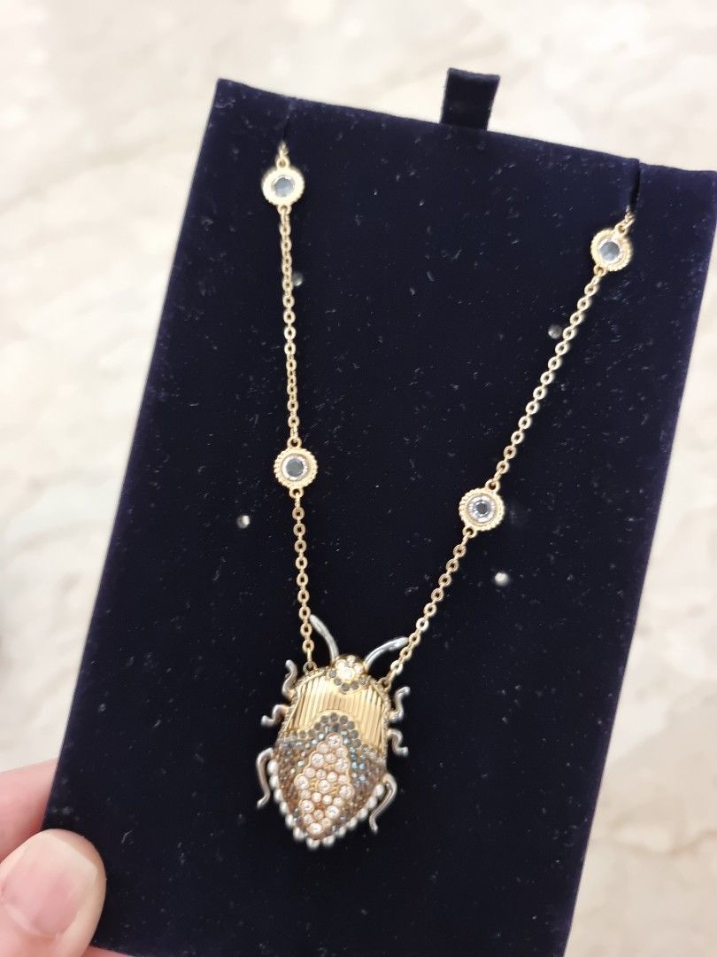 Swarovski beetle earrings top