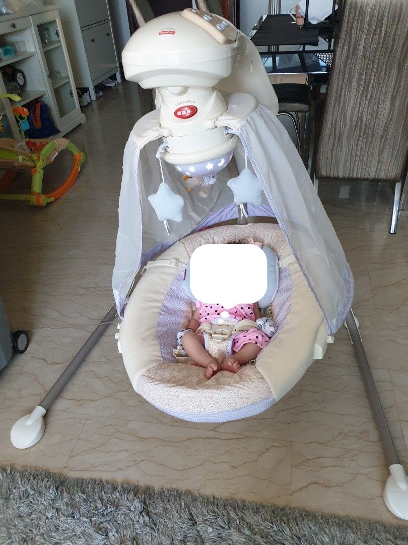 Fisher price electric swing top