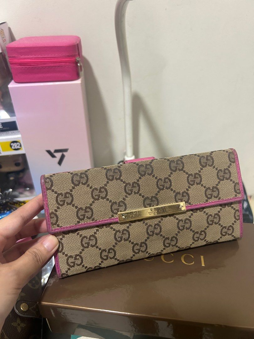 Gucci pink long wallet with box (Category: Wallets & Card holders) located in Quezon City. Submitted by thebagkarmaph (Listing ID 1327555147, Image 1). Description: No major issue With box and controllato .