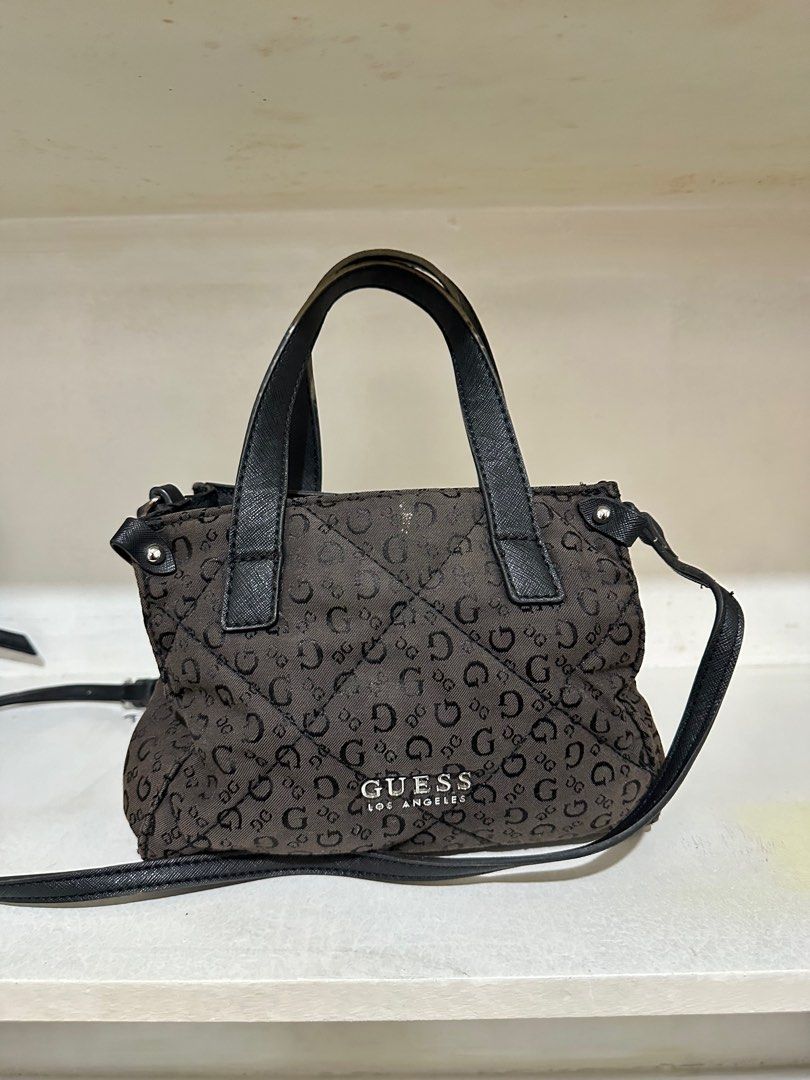 Guess Cross Body Bag Black (Category: Cross-body Bags) located in Makati City. Submitted by niklaurels (Listing ID 1327526265, Image 2). Description: Authentic Guess Cross Body Bag Black .