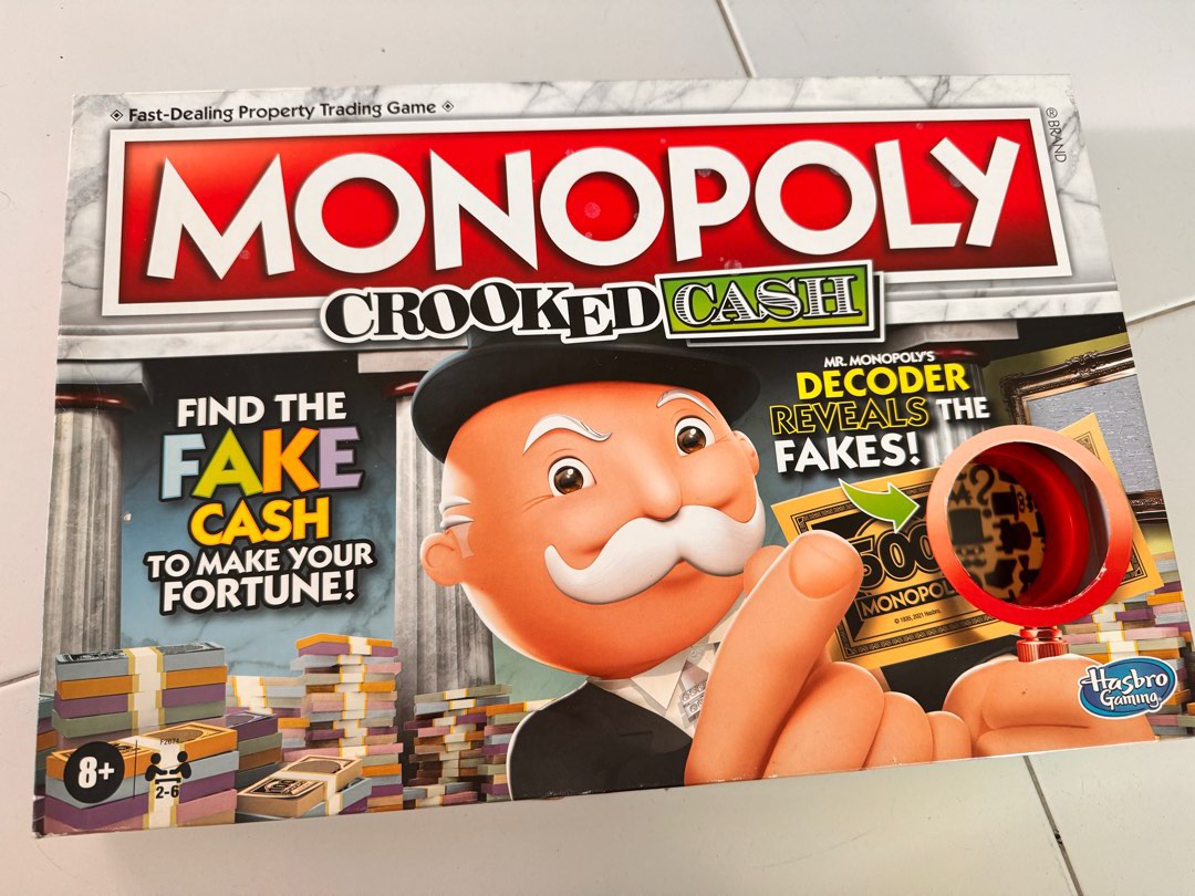 Juego De Mesa Cocodrilo Sacamuelas Monopoly Juego De Mesa De Decodificador De Efectivo Para Familias Y Niños De 8 Años En Adelante, Incluye El Decodificador De Mr. Monopoly Para Encontrar Falsificaciones, Para