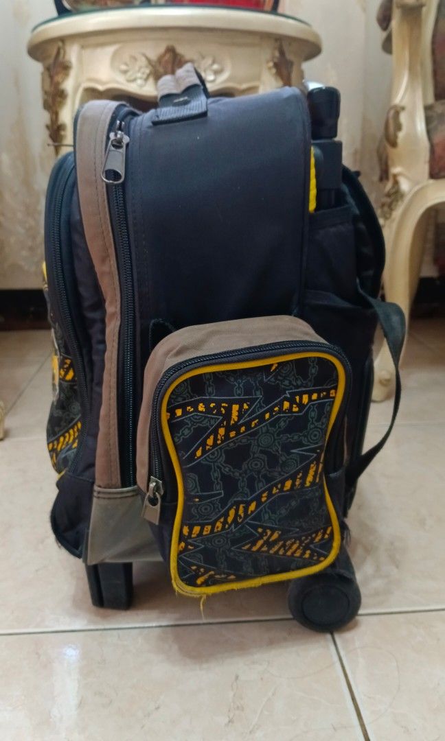 School Trolley bag (Category: Strollers) located in Taytay. Submitted by reese511 (Listing ID 1327408683, Image 3). Description: My son's Preloved school trolley Flaw: Hole sa lagayan ng tumbler and handle ng zipper. See pic..