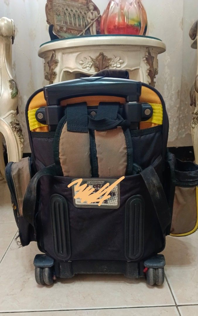 School Trolley bag (Category: Strollers) located in Taytay. Submitted by reese511 (Listing ID 1327408683, Image 2). Description: My son's Preloved school trolley Flaw: Hole sa lagayan ng tumbler and handle ng zipper. See pic..