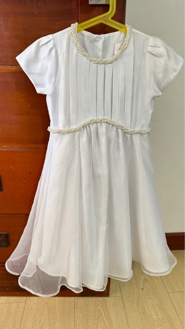 White dress for kids (Category: Babies & Kids Fashion) located in Cainta. Submitted by aurahgem (Listing ID 1327432628, Image 1). Description: 4T on tag.nice in actual .