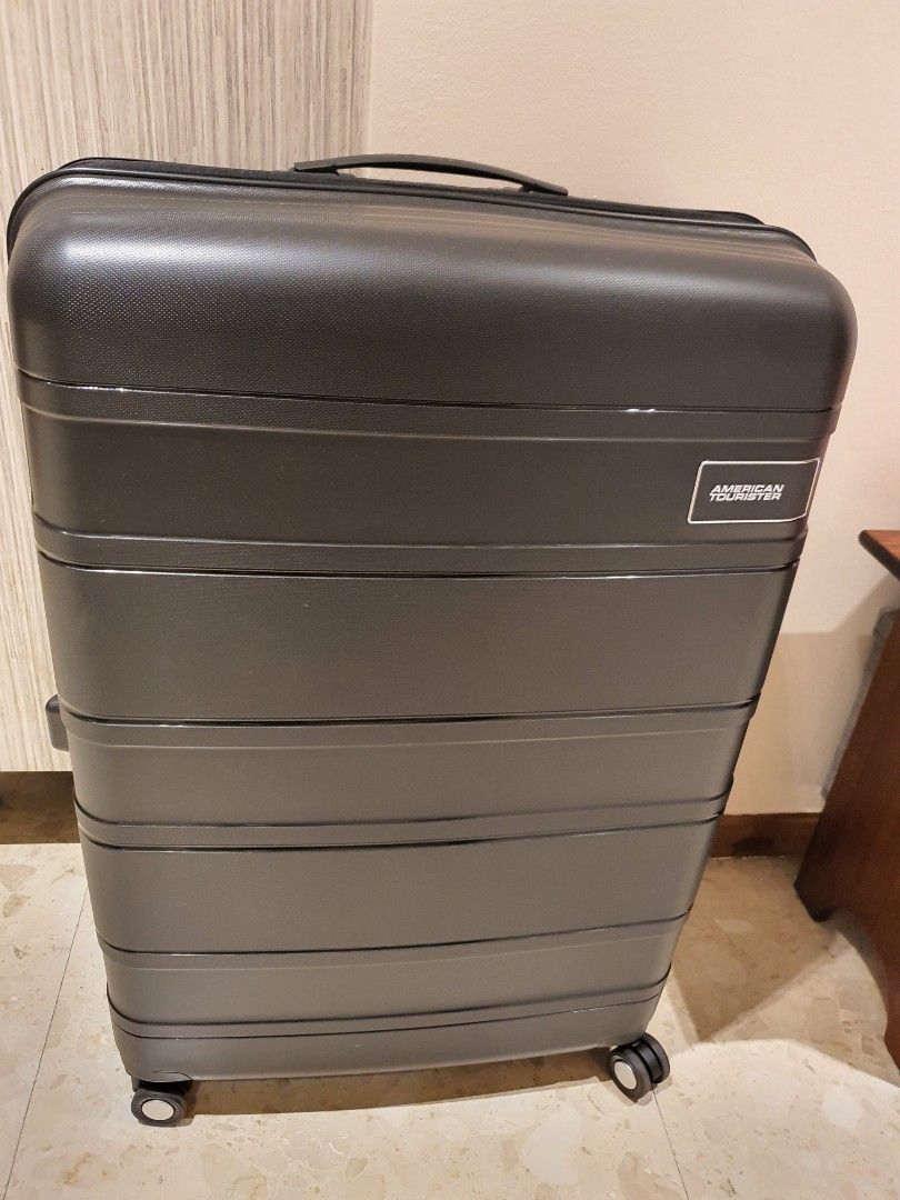 American tourister 31 inch Large Luggage light weight 4kg fixed price