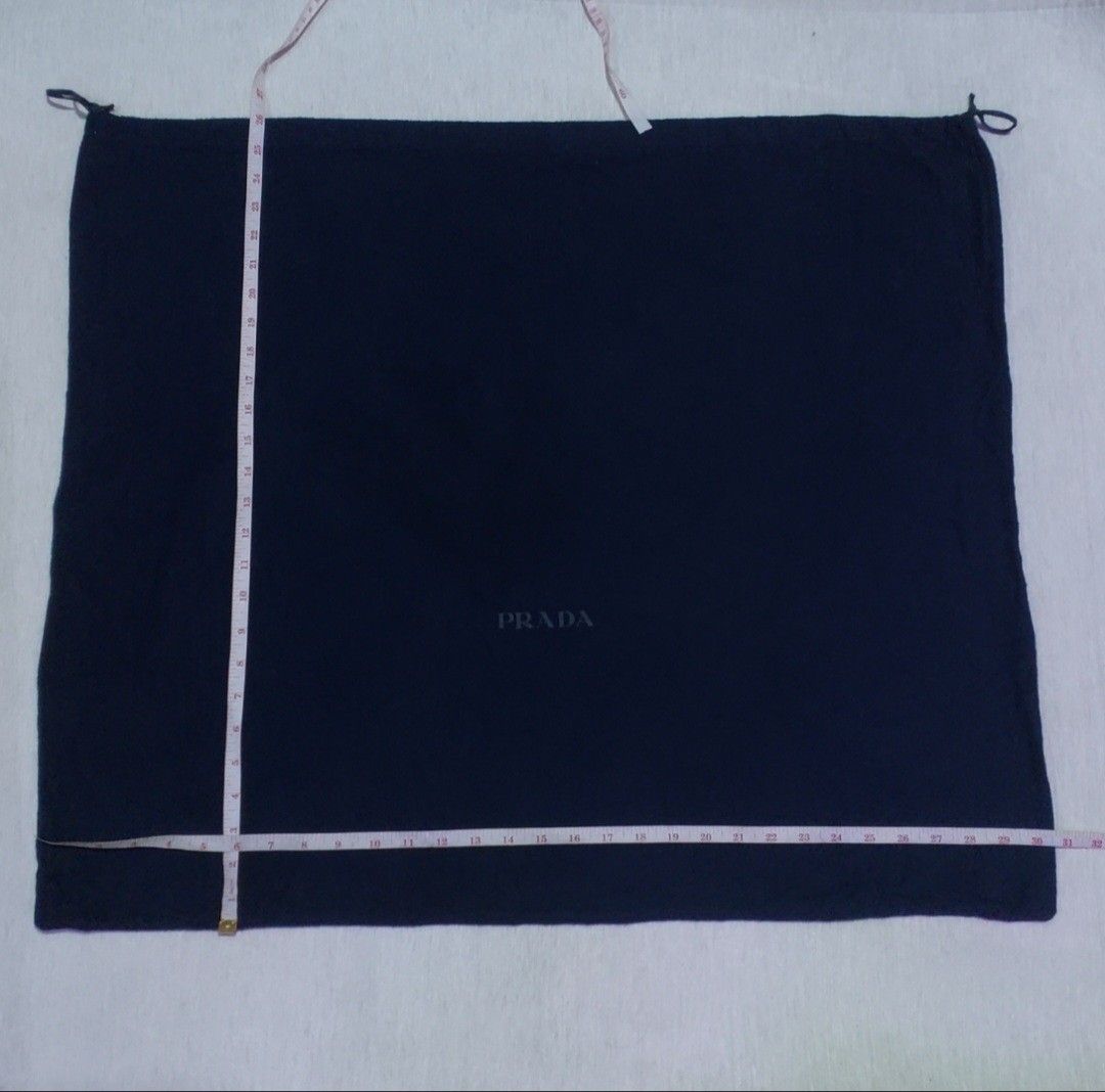 Authentic Prada dust bag 26x30.5 inches (Category: Luxury Bags & Wallets) located in Manila. Submitted by jfluxury.co (Listing ID 1327645070, Image 3). Description: excellent condition no flaws bought in Japan 🇯🇵 💯% Authentic. 😊 Money back guarantee. 😊 Clean and ready to use na po.