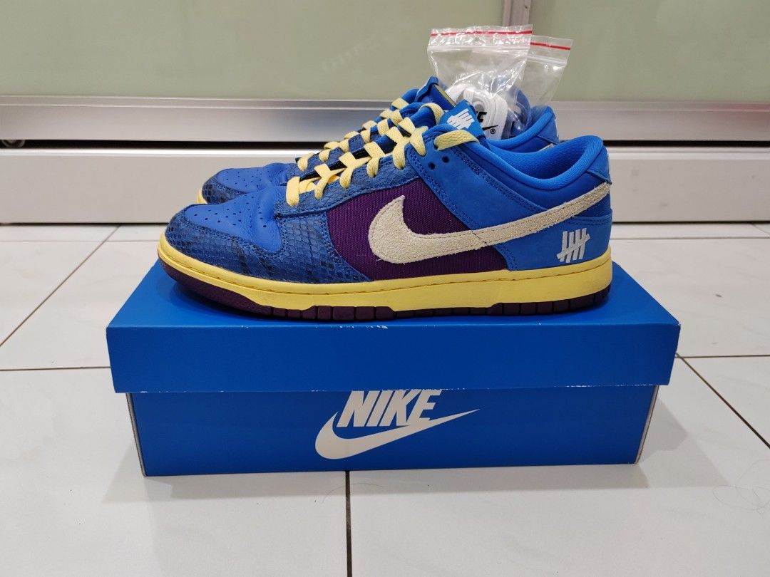 dunk low x undefeated 5 on it