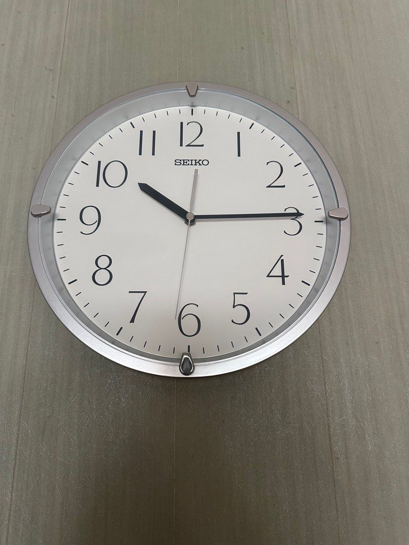 Seiko Wall Clock QHA007S (Category: Wall Decor) located in Manila. Submitted by seikowatchfactory (Listing ID 1327659471, Image 1). Description: Brand New in Box Authentic Seiko Clock 10/10 Model: QHA007S Price: 1495 pesos Specifications: Case Material: Silver Plastic Case Black Arabic Numerals Clock Type: Wall Clock Size: 30 x 4.2cm Battery: AA x 1 Weight: 0.65 kg 1 year Seiko official warranty White Dial Seller is Authorized Dealer of Seiko Jap