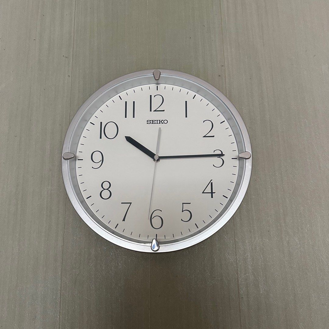 Seiko Wall Clock QHA007S (Category: Wall Decor) located in Manila. Submitted by seikowatchfactory (Listing ID 1327659471, Image 3). Description: Brand New in Box Authentic Seiko Clock 10/10 Model: QHA007S Price: 1495 pesos Specifications: Case Material: Silver Plastic Case Black Arabic Numerals Clock Type: Wall Clock Size: 30 x 4.2cm Battery: AA x 1 Weight: 0.65 kg 1 year Seiko official warranty White Dial Seller is Authorized Dealer of Seiko Jap