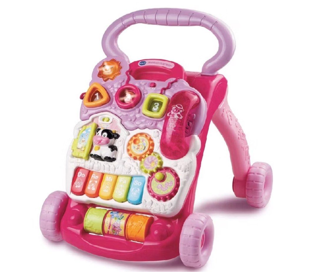 VTech Sit-to-Stand Learning Walker (Pink) (Category: Infant Playtime) located in Quezon City. Submitted by cdgextra (Listing ID 1327625676, Image 1). Description: Barely used! Still looks brand new. SRP 3,399 Recommended for ages 9 to 36 months Material: Plastic Adjustable speed control on wheels. Protects beginning walkers. Detachable learning centre introduces words, numbers, shapes, animals, and colours Contains a role-play mobile phone for ad