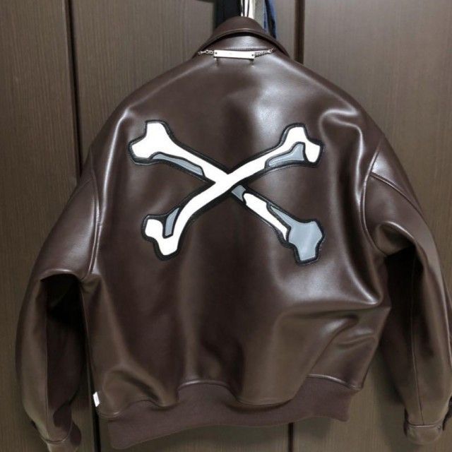 WTAPS bone appliqué faux-leather bomber jacket (Category: Coats, Jackets and Outerwear) located in Taguig. Submitted by stryan (Listing ID 1327606531, Image 2). Description: WTAPS bone appliqué faux-leather bomber jacket from japan -condition 10/10, no issues or any discoloration, fit for Small stature thin to medium fit men or women around 5'5" - 5'6" -If buying both black and brown colorway will give it for 50k and free shipping - Size X01 = Sm