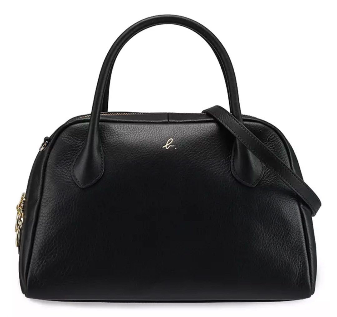 Agnes b Boston medium top handle bag black (Category: Bags & Wallets) located in Singapore. Submitted by happyhippo11 (Listing ID 1327771433, Image 1). Description: Preloved Agnes b Boston medium top handle bag black Signs of wear on handles and logo is partially scratched .