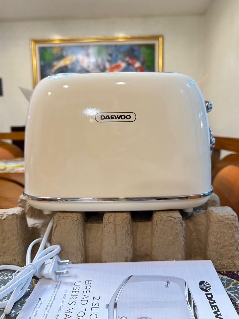 Bread Toaster Daewoo Brand New (Category: Ovens & Toasters) located in Manila. Submitted by rnc.shop (Listing ID 1327833742, Image 3). Description: 2 Slice Bread Toaster Daewoo (DBT-01CRM) -Brand new/ never been used, with box WEIGHT: 1350 g DIMENSIONS: 29 × 18 × 19 cm MATERIAL: Stainless Steel VOLTAGE: 220-240V 50/60Hz AC POWER: 685-815 Watts COLOR : Cream Versatile Toasting: Features bagel, cancel, and defrost functions. Toast bagels evenly, ca