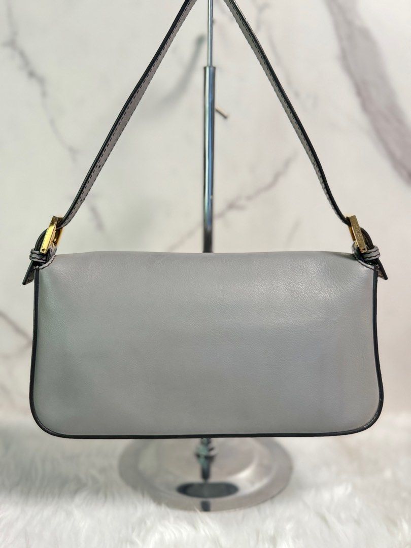 FENDI Vitello Flamingo Enamel Interchangeable Strap Baguette (Category: Luxury Bags & Wallets) located in Pasig City. Submitted by arpees.co (Listing ID 1327763355, Image 2). Description: Inclusions dust bag mirror unused srap Legit Grails.